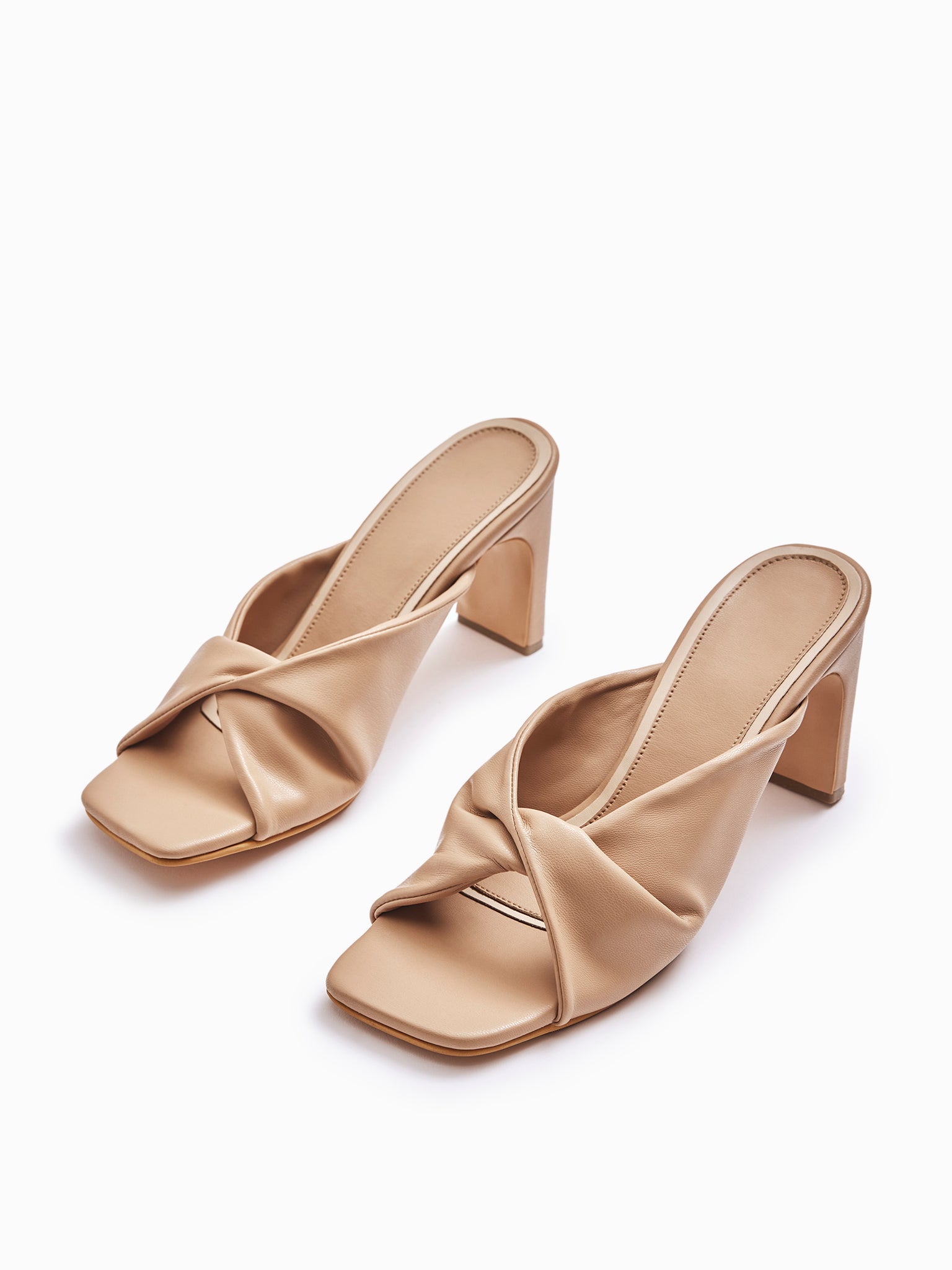 Beige Knotted Stilettos
Beige Knotted Stilettos