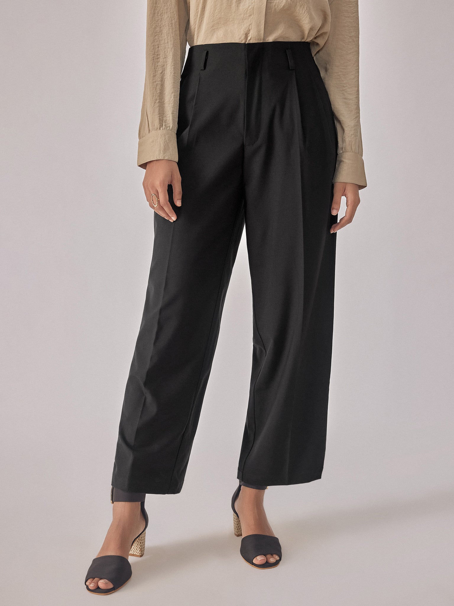 Black Pleated Flare Trousers
Black Pleated Flare Trousers