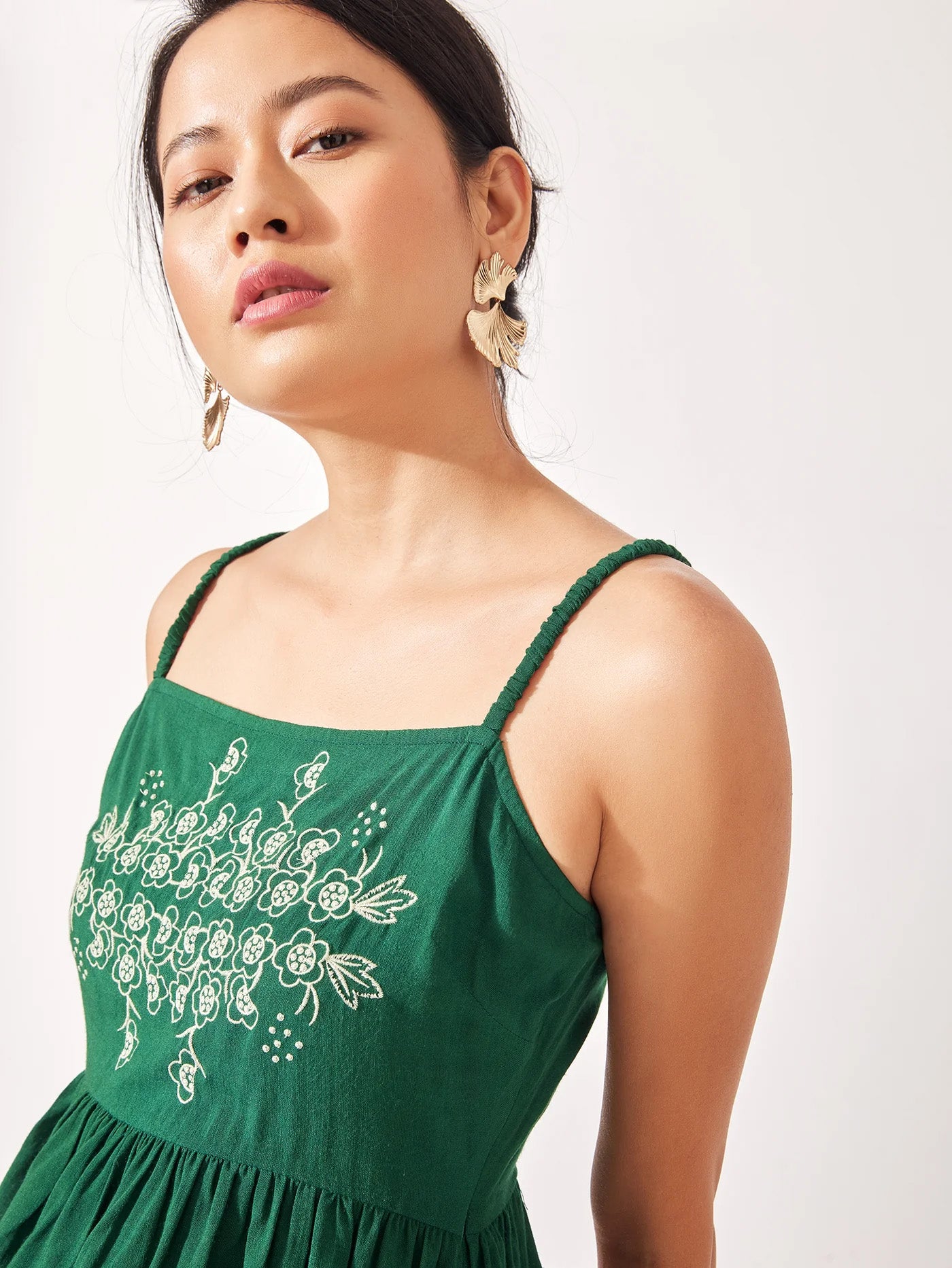 Green Embroidered Peplum Cami
Green Embroidered Peplum Cami