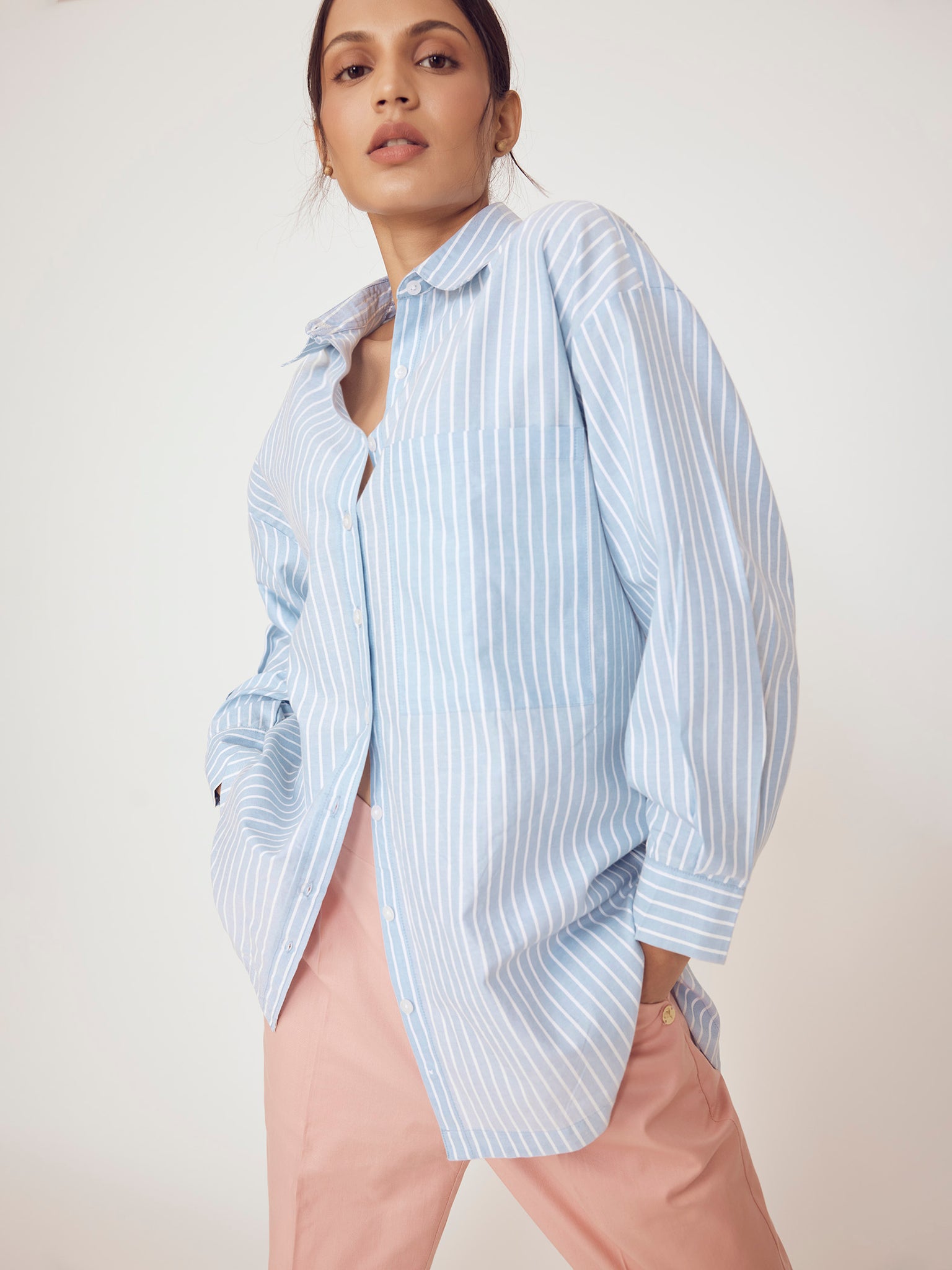 Light Blue Striped Oversized Shirt
Light Blue Striped Oversized Shirt