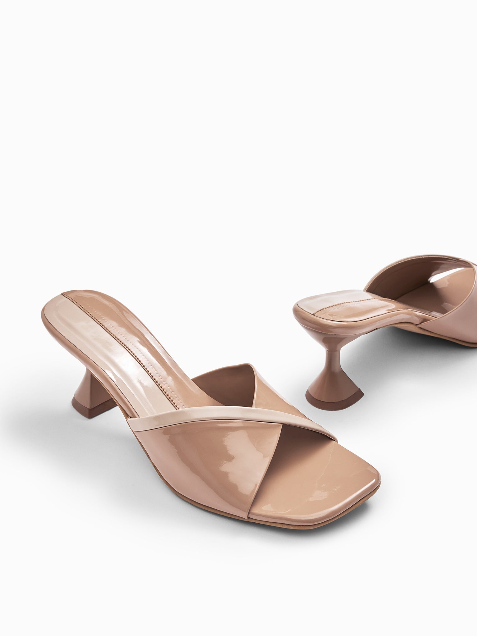 Nude & Beige Spool Heels
Nude & Beige Spool Heels