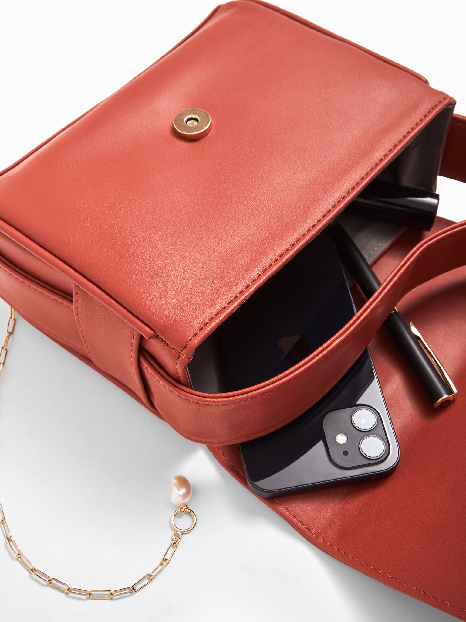 Apple Rivet Detail Sling
Apple Rivet Detail Sling