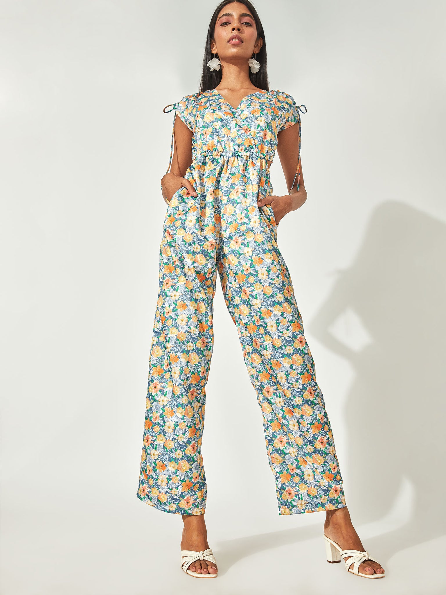 Aqua Floral Cut-Out Jumpsuit 
Aqua Floral Cut-Out Jumpsuit