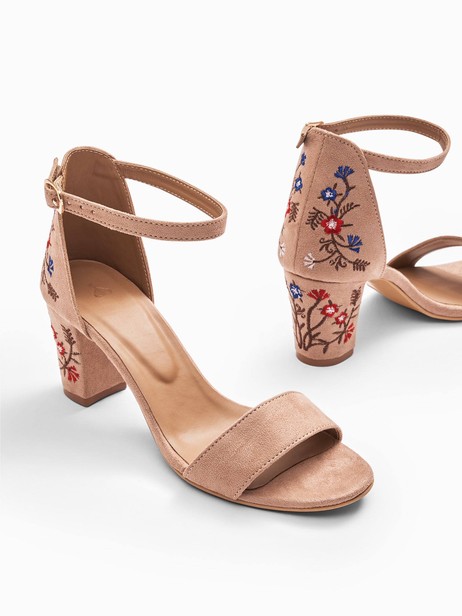 Beige Embroidered Block Heels
Beige Embroidered Block Heels