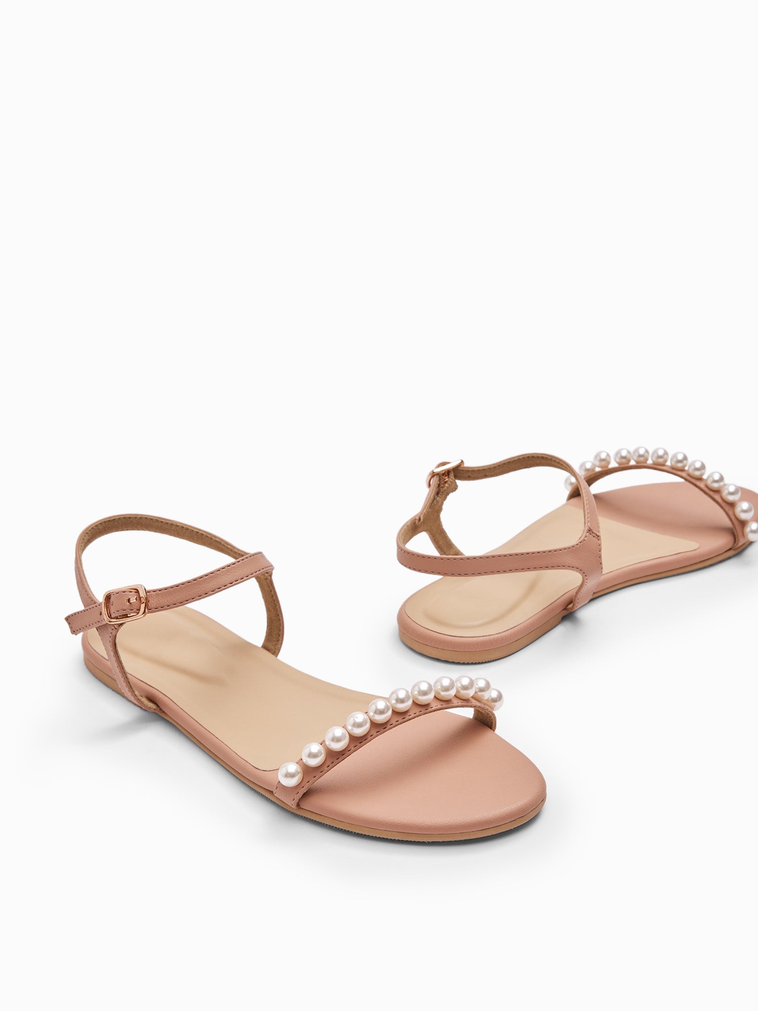 Blush Pearl Embellished Flats
Blush Pearl Embellished Flats