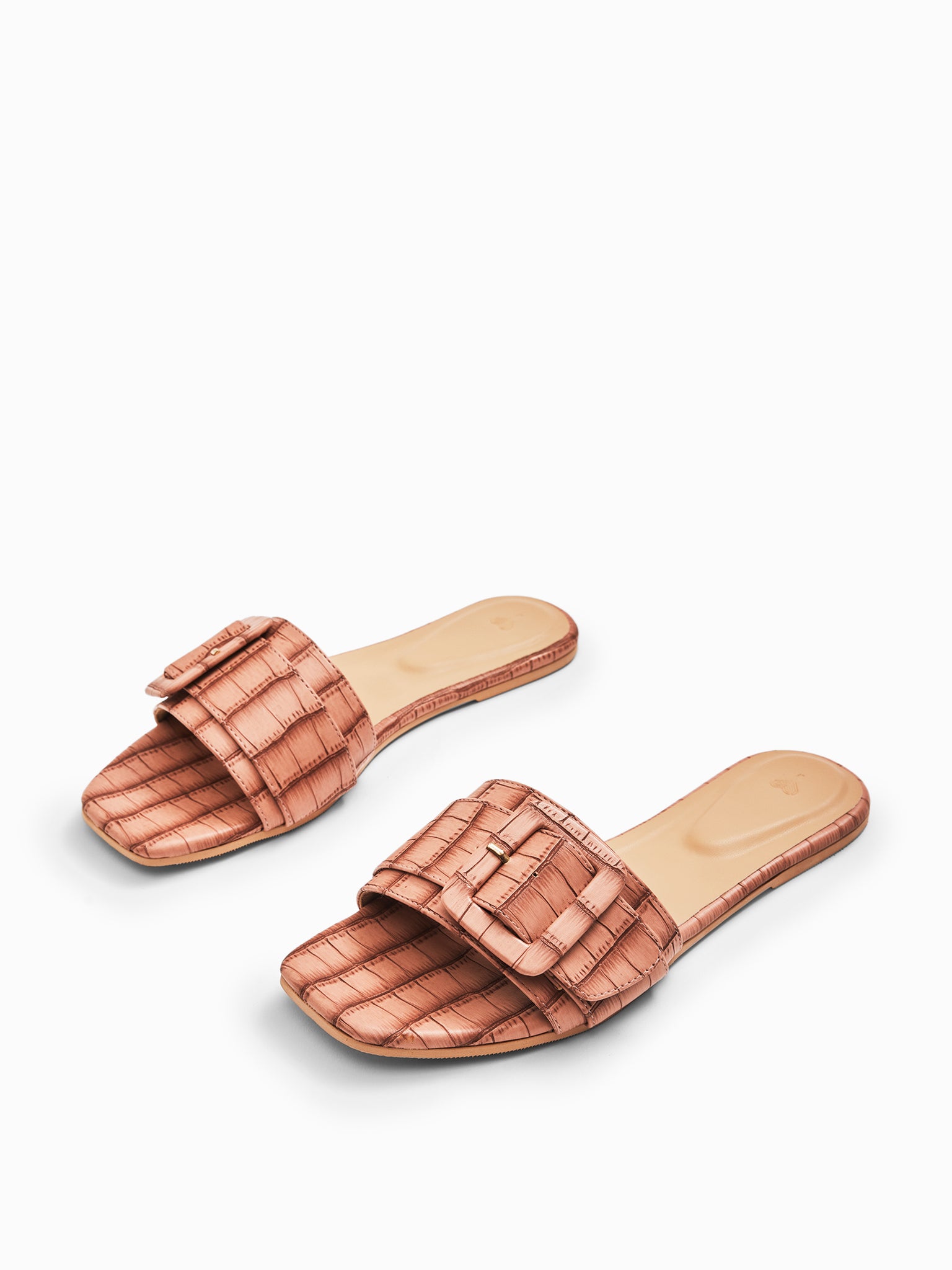 Blush Textured Buckle Flats
Blush Textured Buckle Flats
