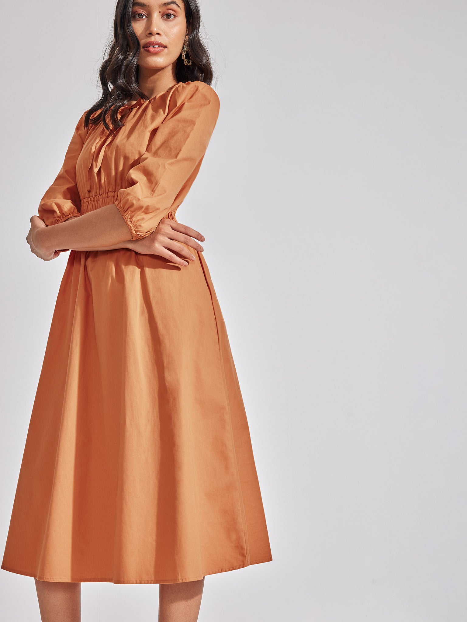 Caramel Smocked Midi Dress
Caramel Smocked Midi Dress