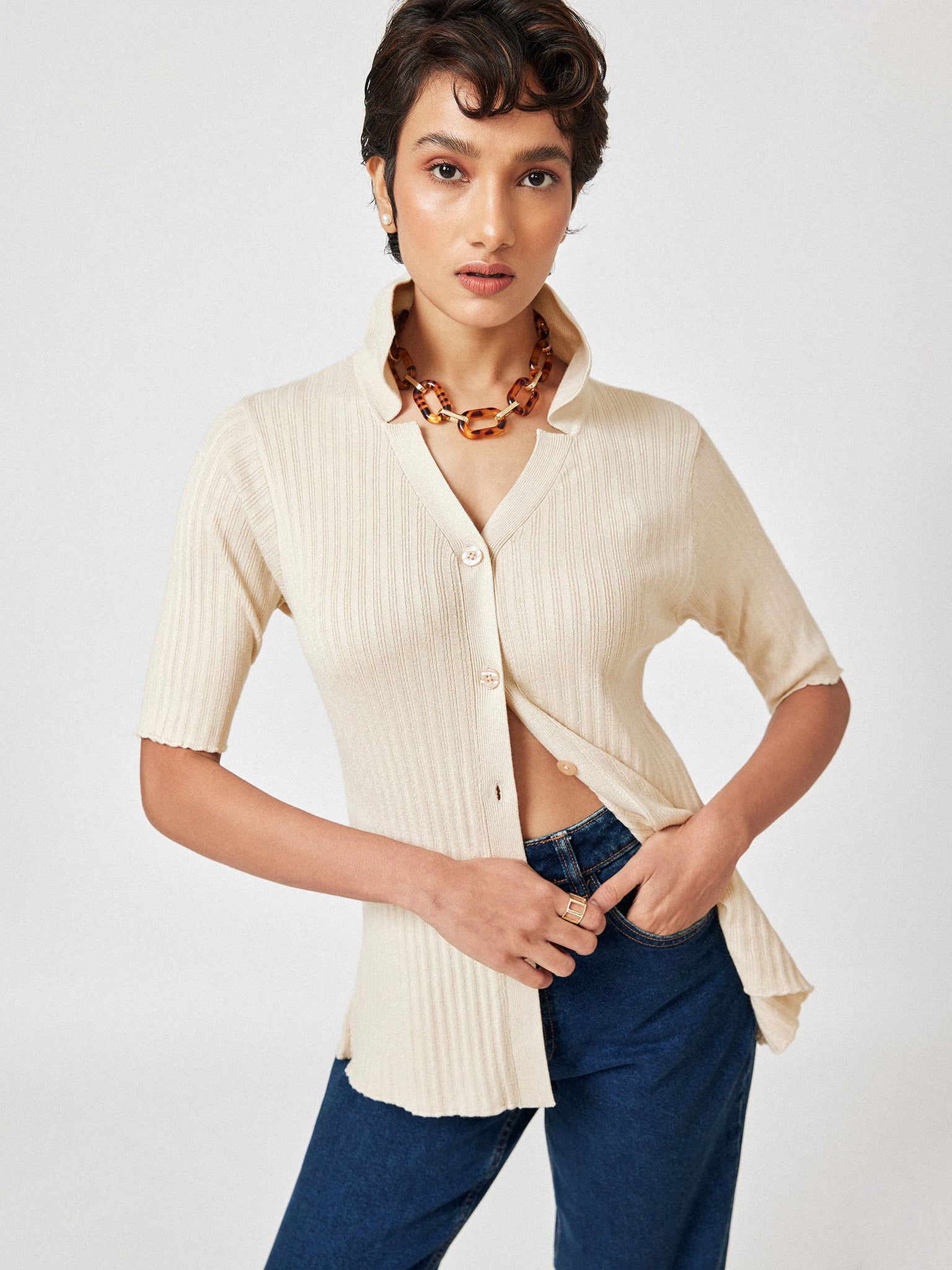 Cream Button Down Cardigan
Cream Button Down Cardigan