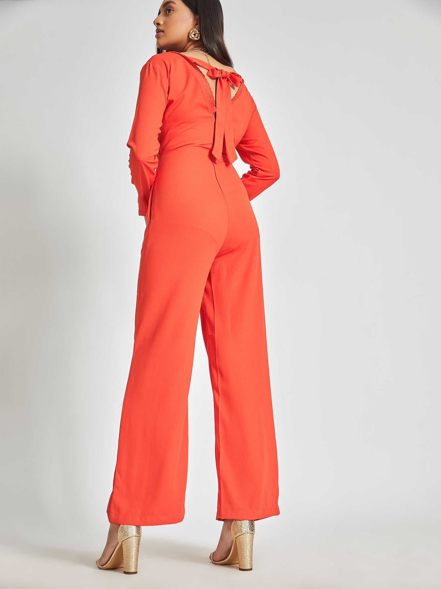 Crimson Back Tie Flare Jumpsuit
Crimson Back Tie Flare Jumpsuit