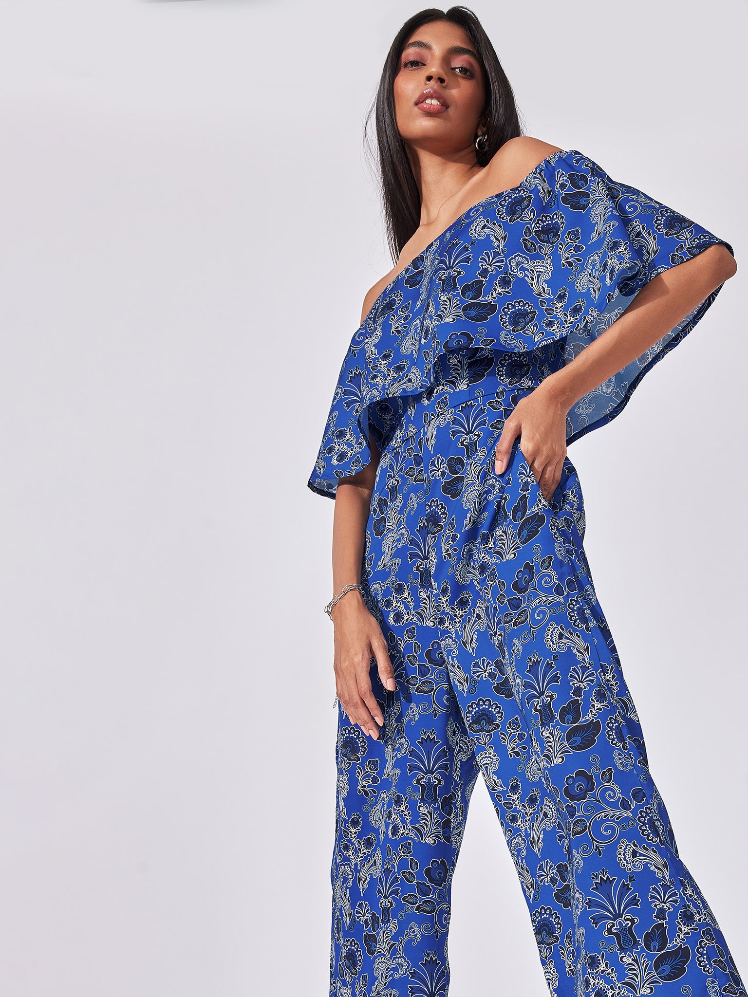 Lapis Floral Flared Jumpsuit
Lapis Floral Flared Jumpsuit