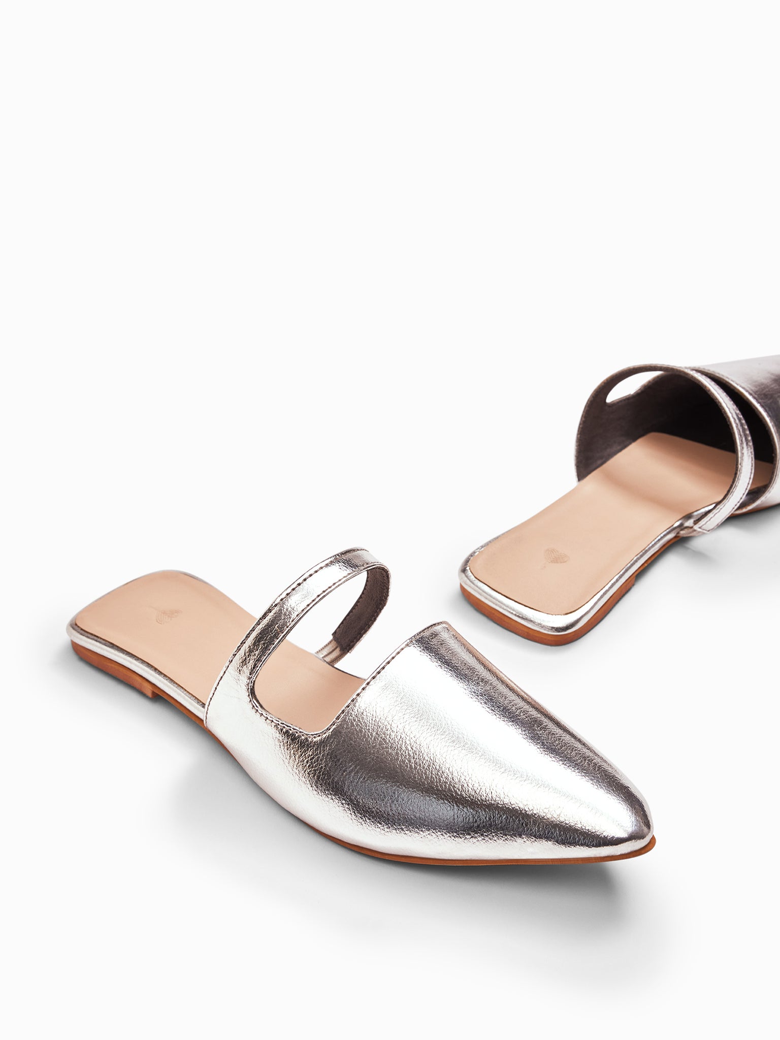 Metallic Cut Out Strap Mules
Metallic Cut Out Strap Mules