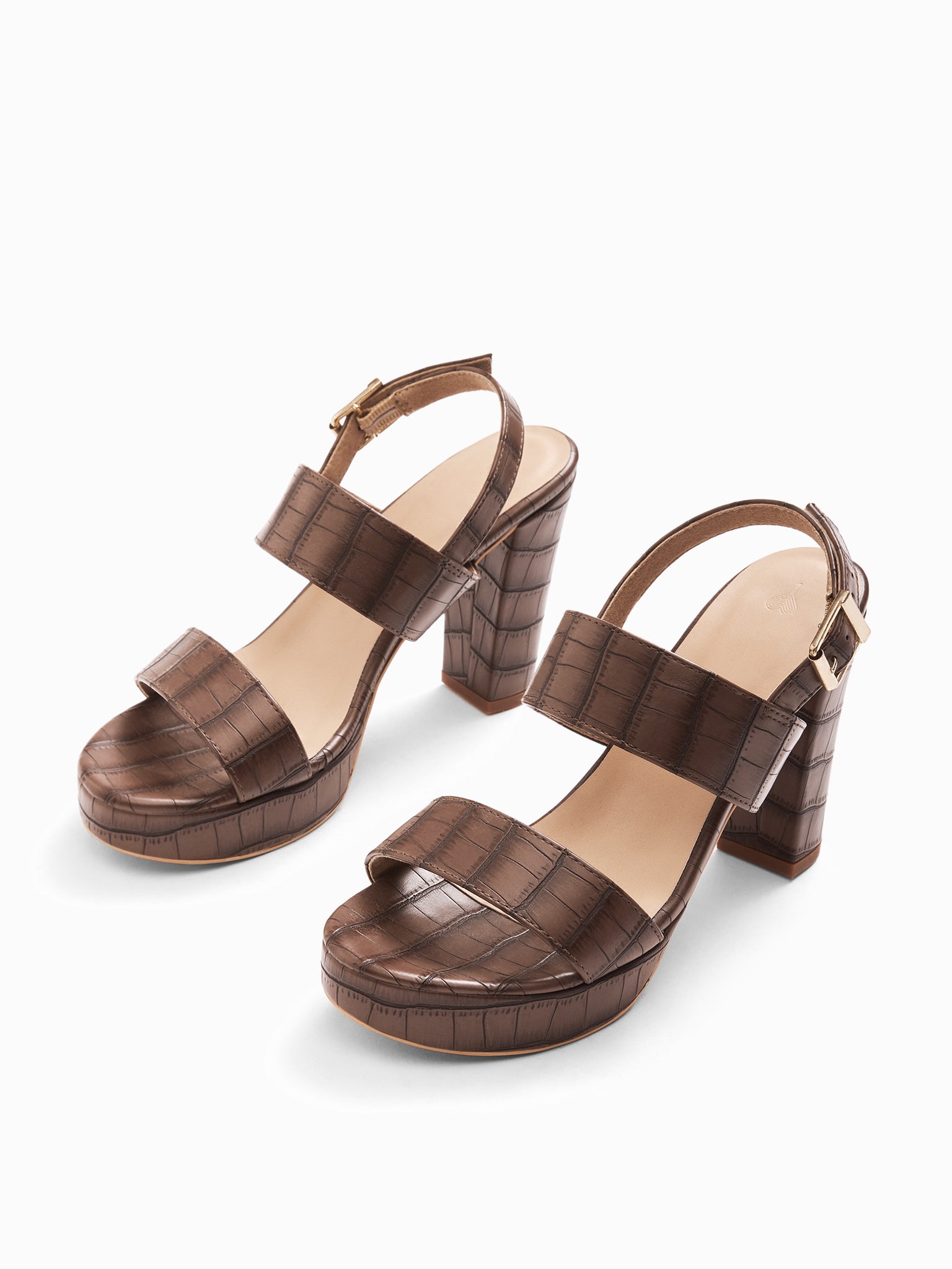 Mocha Textured Platform Heels
Mocha Textured Platform Heels