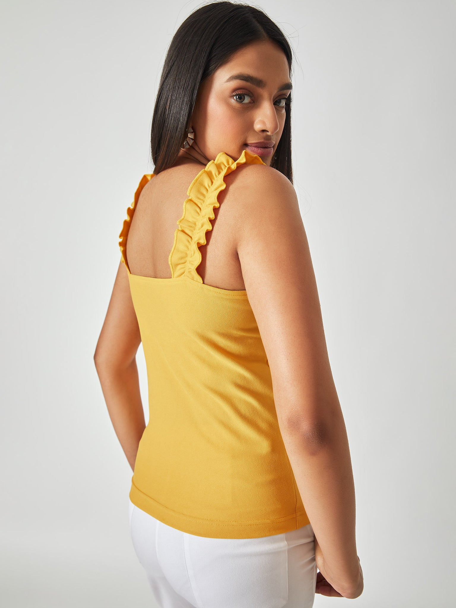 Yellow Ruffle Strap Tank Top
Yellow Ruffle Strap Tank Top