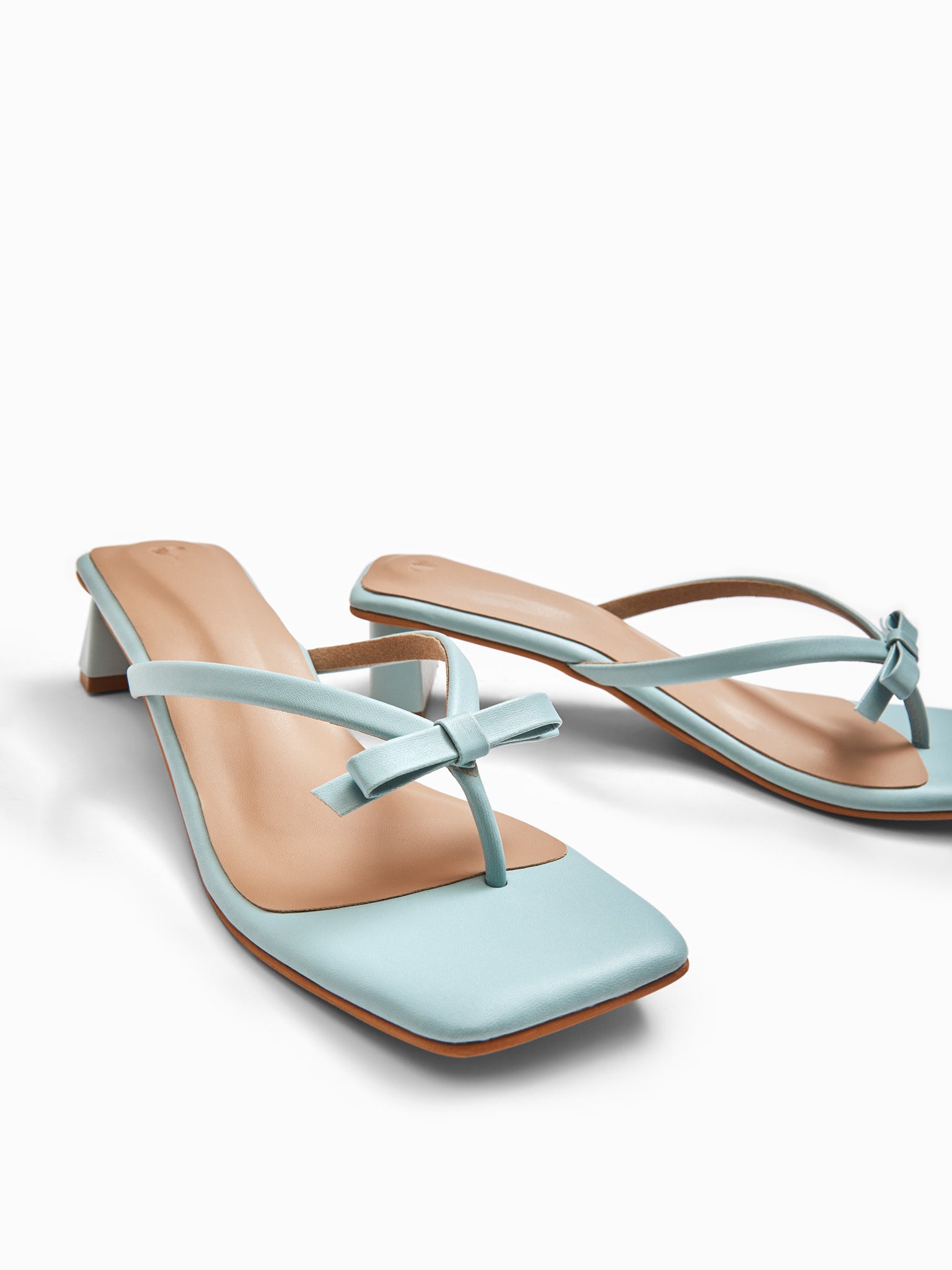 Powder Blue Bow Strap Heels
Powder Blue Bow Strap Heels