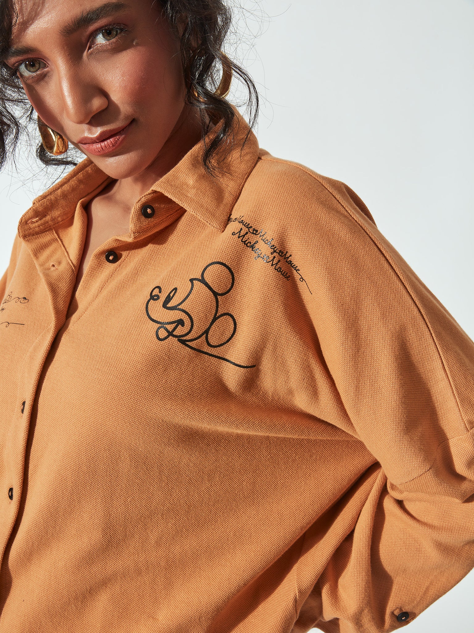 Rust Mickey Crop Shirt by Disney
Rust Mickey Crop Shirt by Disney