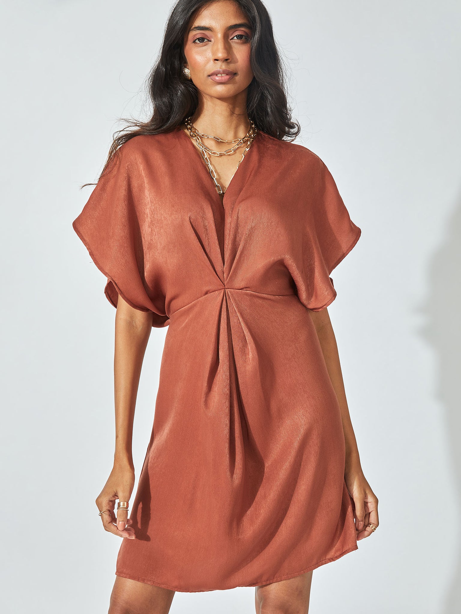 Rust Satin gathered dress
Rust Satin gathered dress