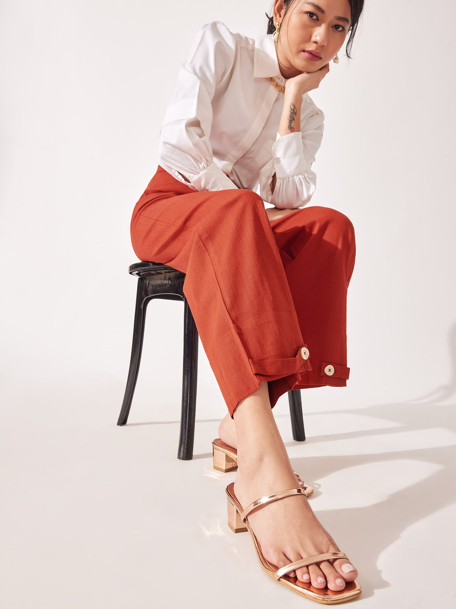 Rust Tab Buttoned Hem Pants
Rust Tab Buttoned Hem Pants