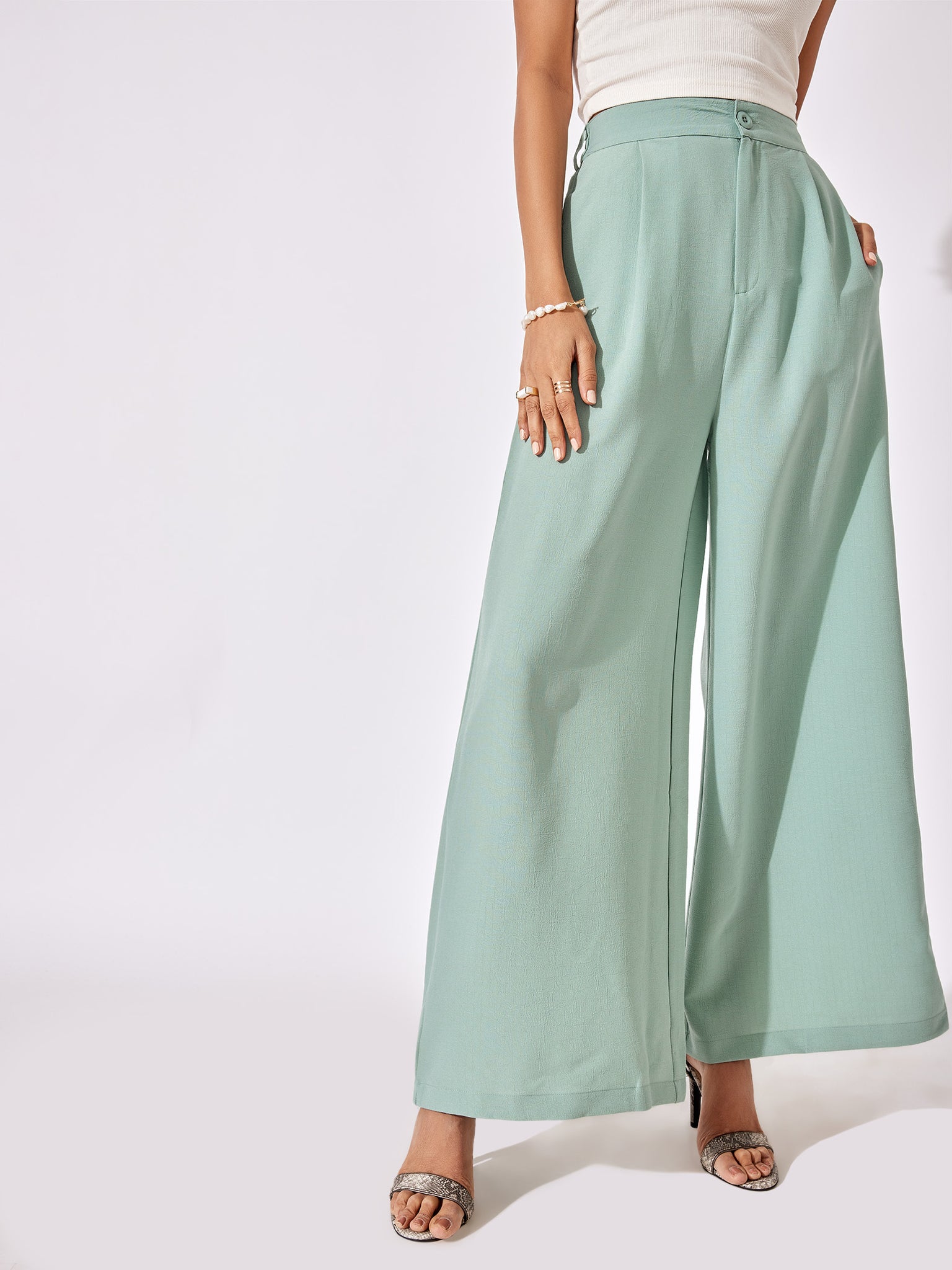 Sage Green Pleated Flare Pants
Sage Green Pleated Flare Pants