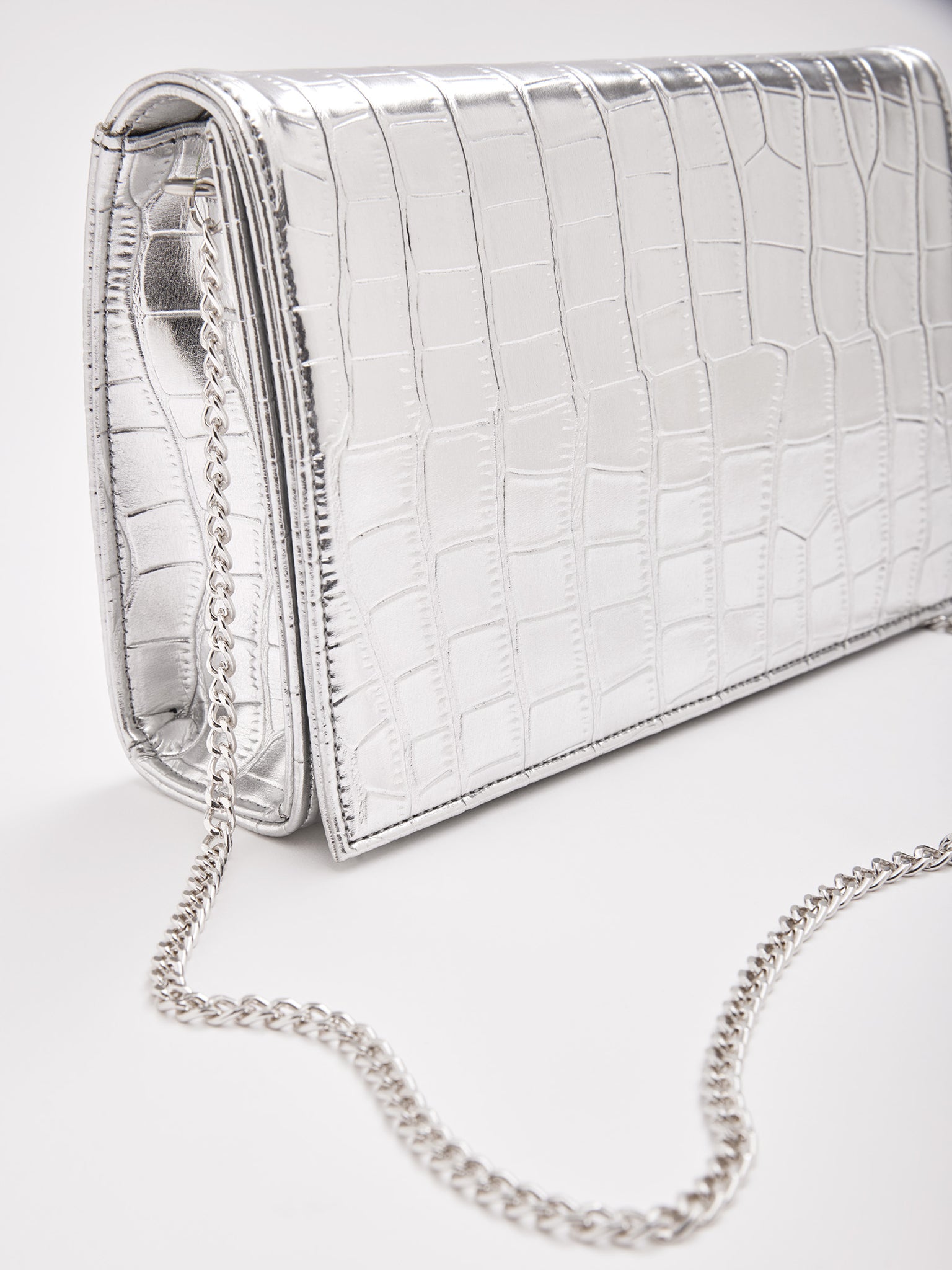 Silver Croc Textured Clutch
Silver Croc Textured Clutch