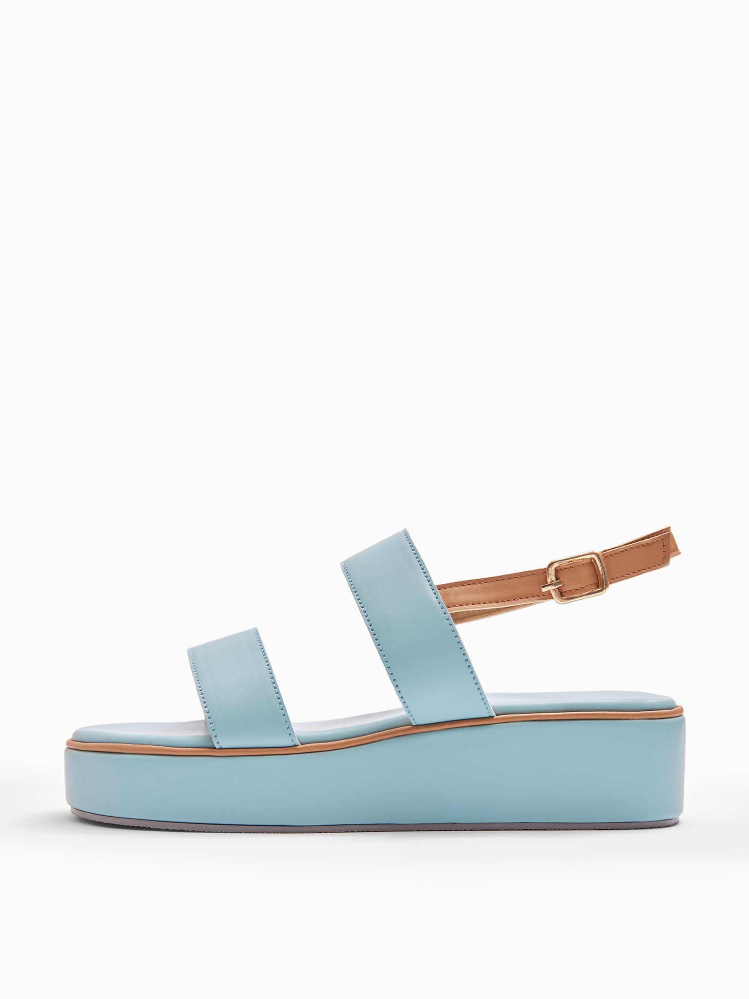 Sky & Beige Strappy Platforms
Sky & Beige Strappy Platforms