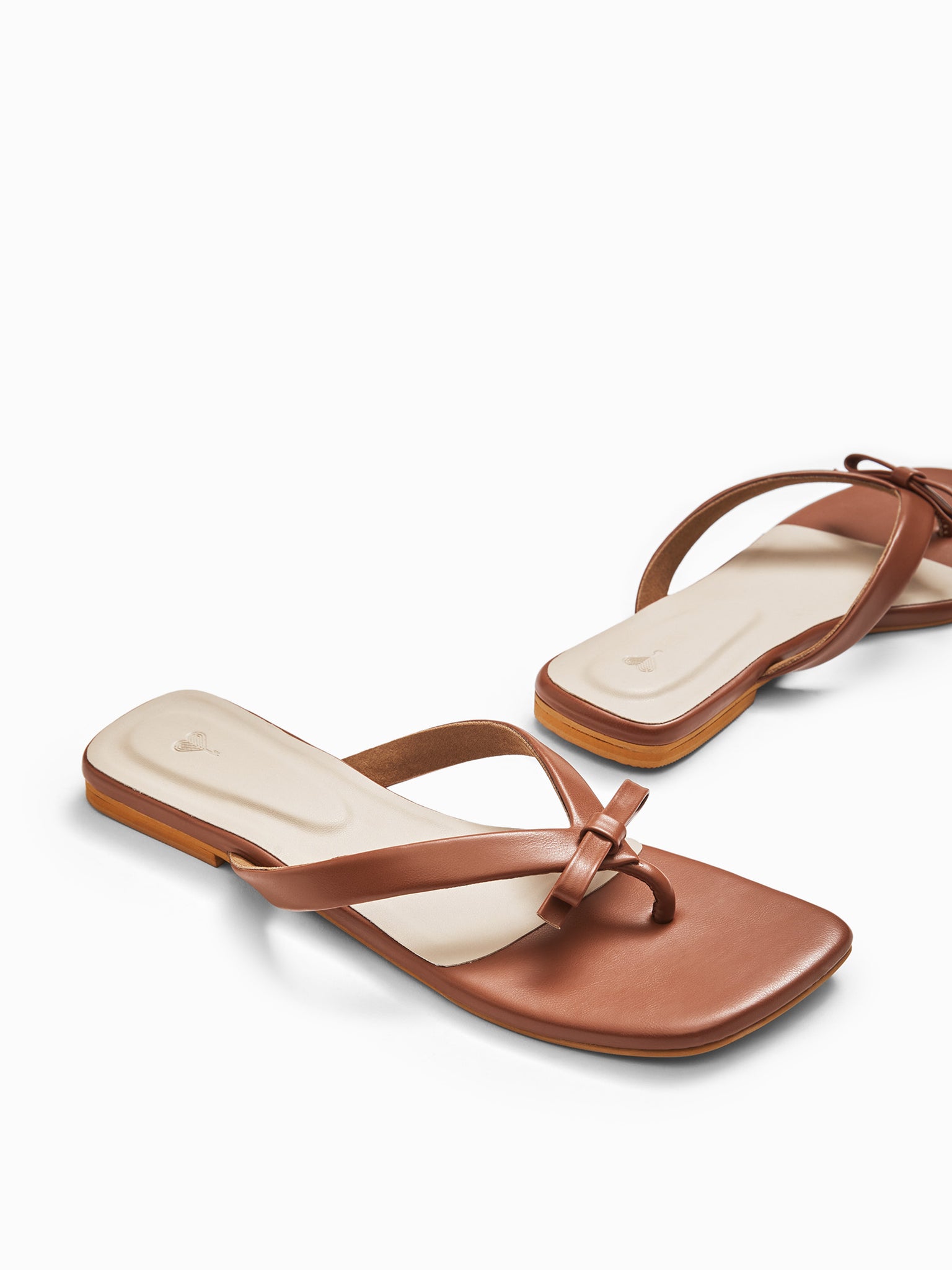 Tan Bow Strap Flats
Tan Bow Strap Flats