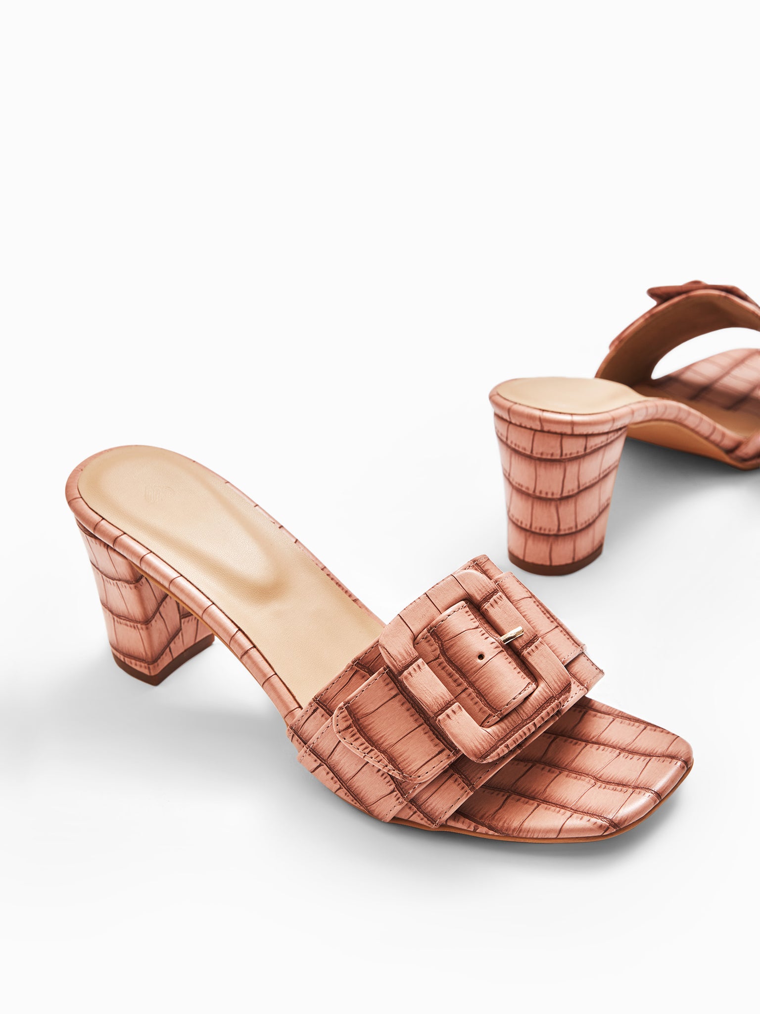 Blush Textured Buckle Heels
Blush Textured Buckle Heels