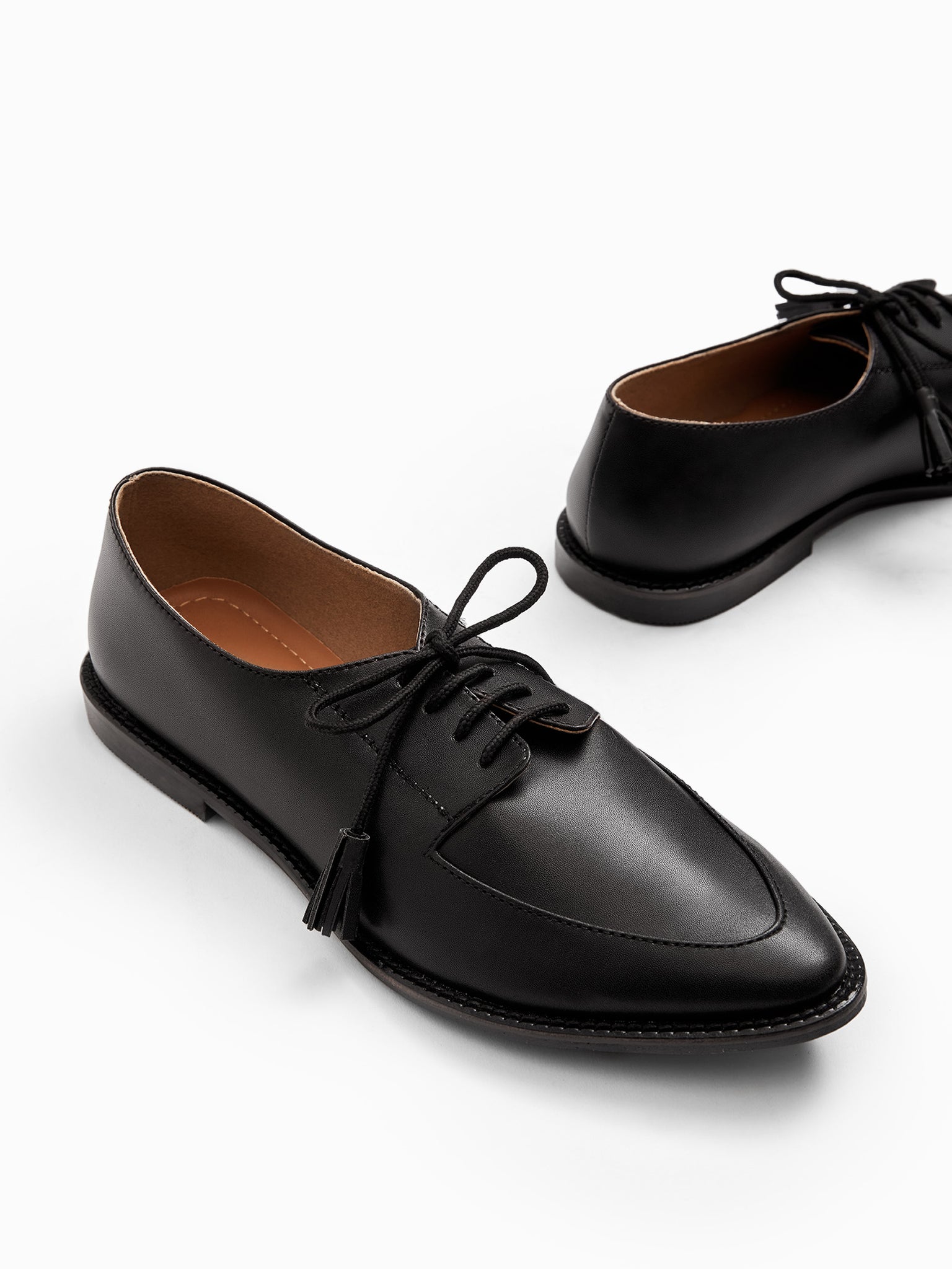 Black Tasseled Brogues
Black Tasseled Brogues