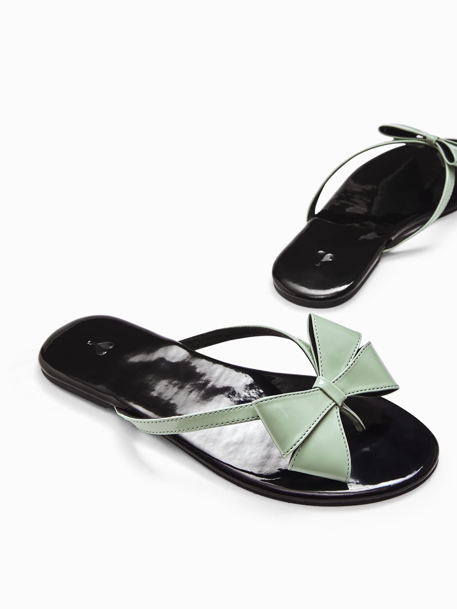 Black Mint Patent Bow Flats
Black Mint Patent Bow Flats