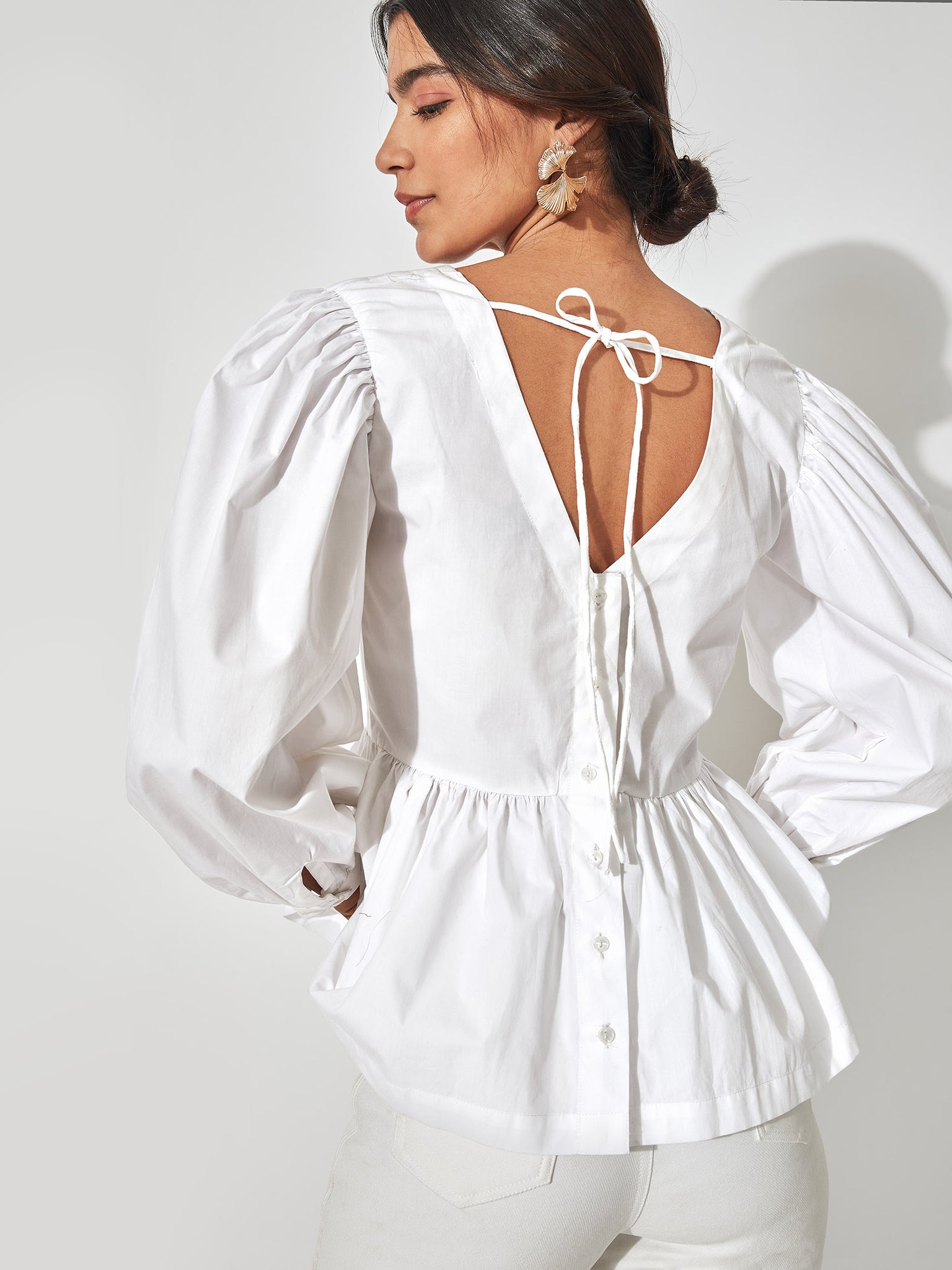 White Back Tie Peplum Top
White Back Tie Peplum Top