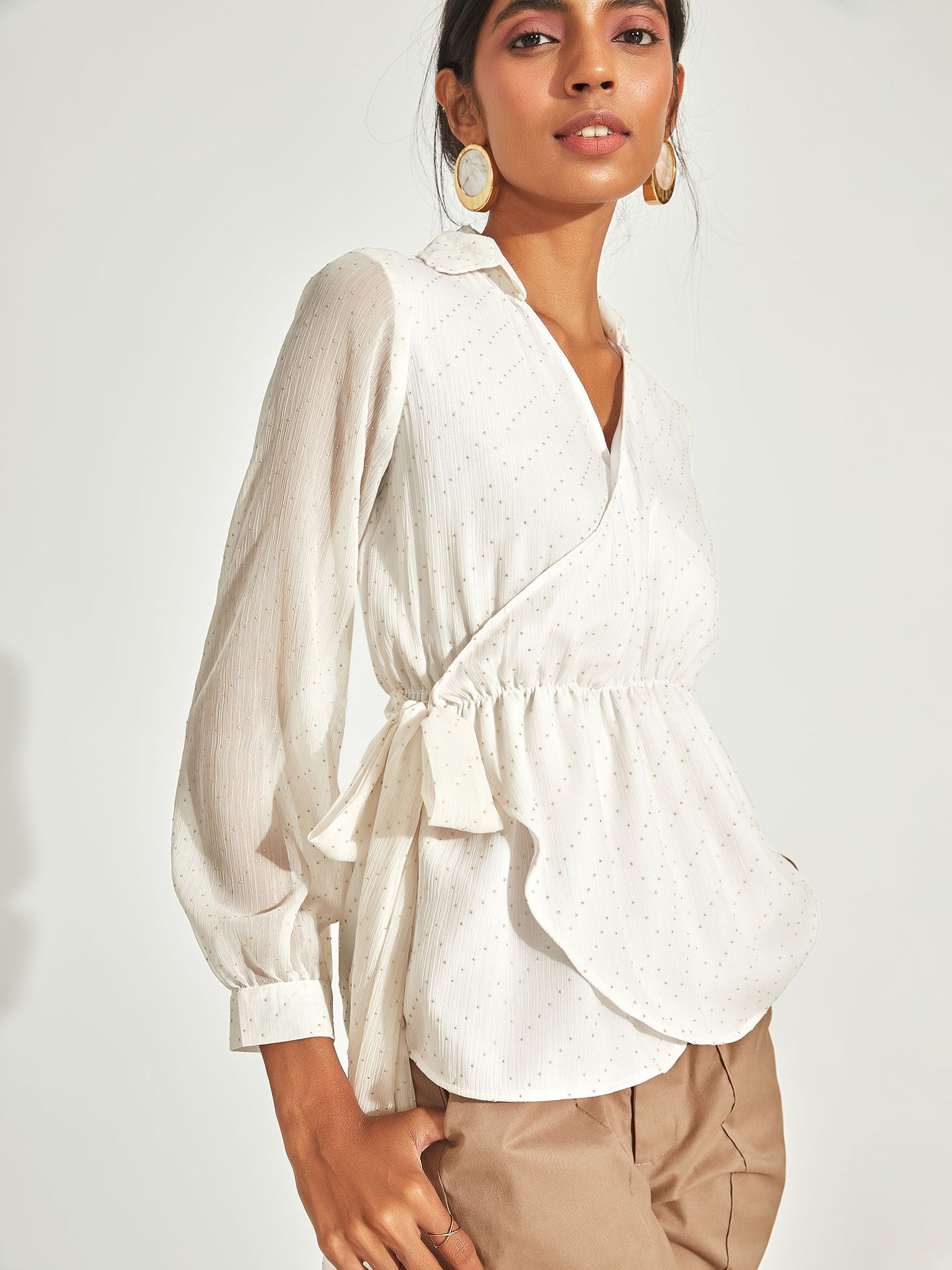 White Beaded Peplum Top
White Beaded Peplum Top