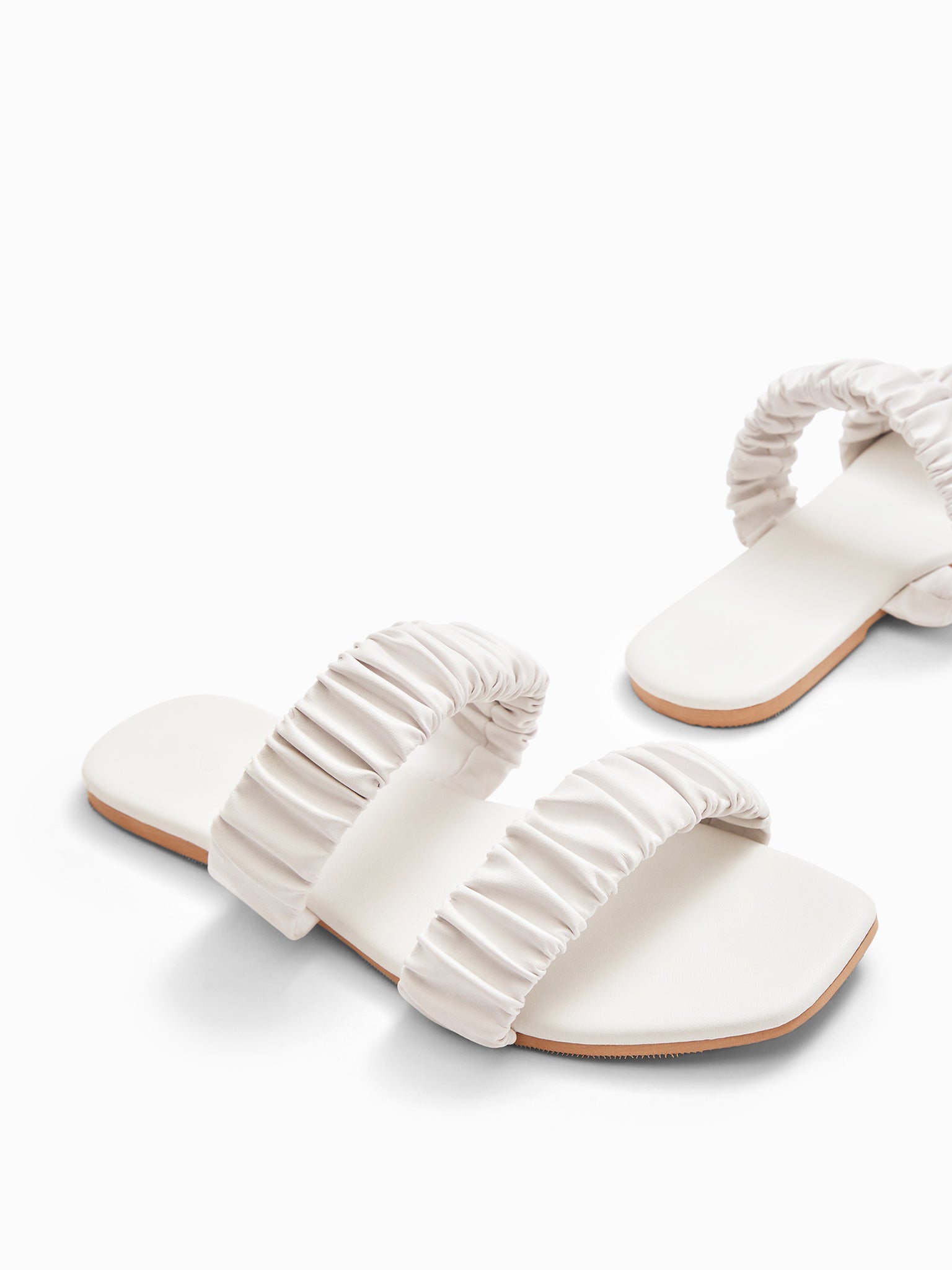 White Ruched Double Strap Slip-Ons
White Ruched Double Strap Slip-Ons