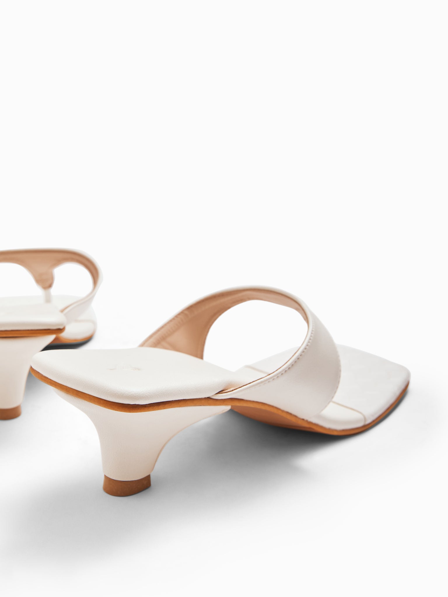 White Strap Kitten Heels
White Strap Kitten Heels